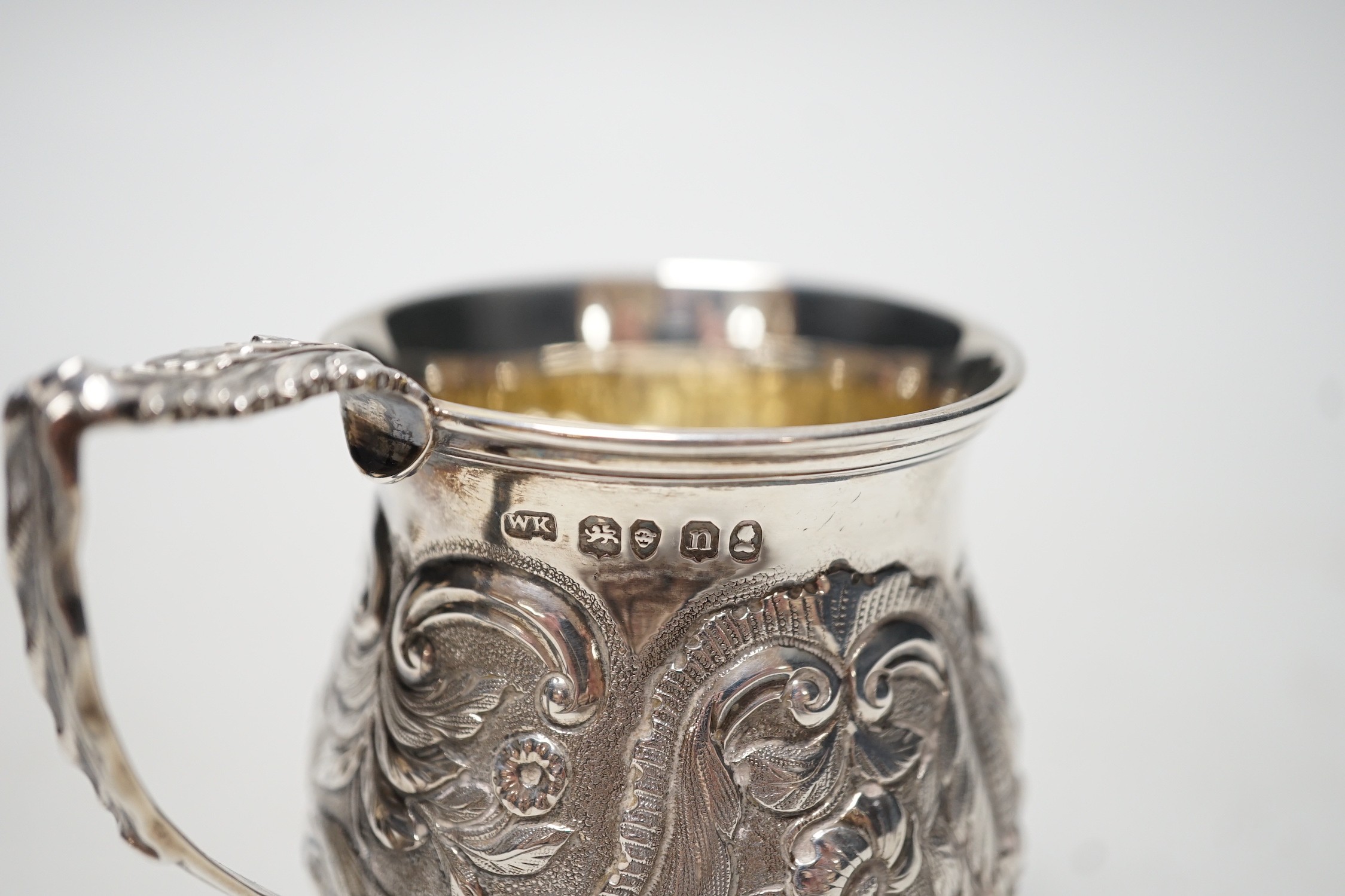 A George IV embossed silver baluster christening cup, London, 1828, 82mm, 3.4oz.